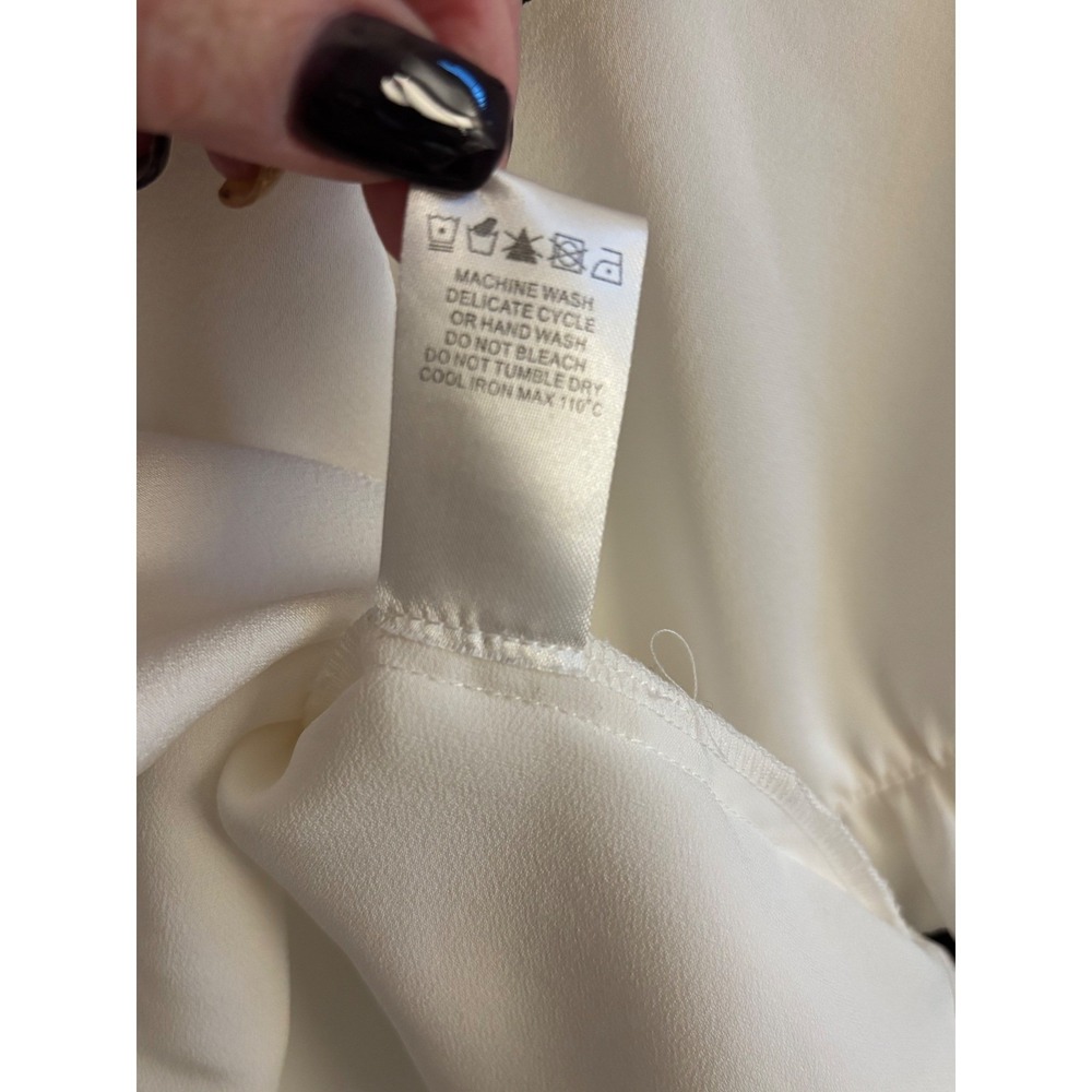 Crosby by Mollie Burch Cream & Black Ruffle Sleeve Top Size XS (Oversized Fit) - Picture 7 of 8